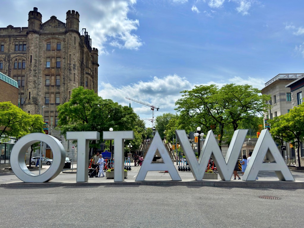 Large 3D letters spelling "OTTAWA" stand as a popular tourist attraction in Ottawa